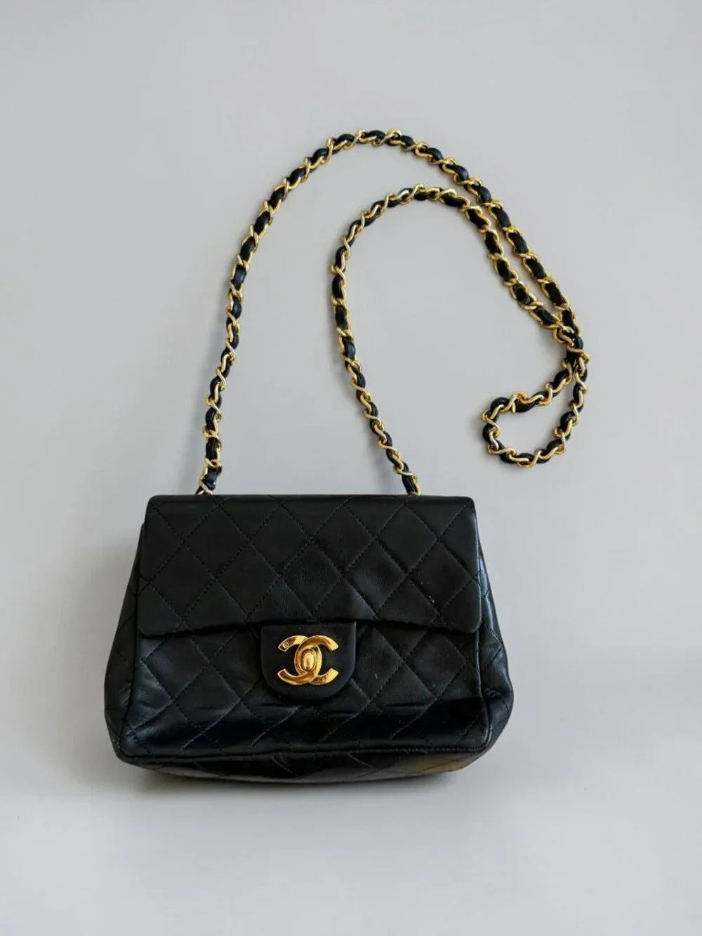 CHANEL Vintage Black Lambskin 24K Mini Flap Crossbody Bag